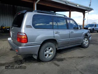 2002 Toyota Land Cruiser z VIN JTEHT05J522027452, wystawiony jako Copart lot #51141595 z przebiegiem 278 465 mil mil oraz Szkoda całkowita • Salvage title. Historia ofert i sprzedaży dostępna na DreamBid. Obrazek 3.