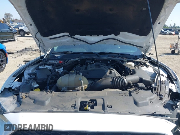 2020 Ford Mustang EcoBoost z VIN 1FATP8UH0L5105965, wystawiony jako IAAI lot #42475841 z przebiegiem 68 999 mil mil oraz . Historia ofert i sprzedaży dostępna na DreamBid. Obrazek 10.
