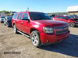 2012 Chevrolet Suburban LS with VIN 1GNSCHE08CR327180, listed as a IAAI auction lot 40229963 with 235,469 mi miles. Bid and sale history available at carsss.com. Image 1.