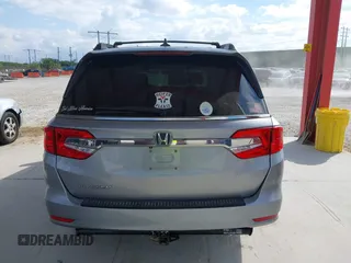 2020 Honda Odyssey EX-L with VIN 5FNRL6H72LB055672, listed as a IAAI auction lot 41586663 with 47,037 mi miles and . Bid and sale history available at carsss.com. Image 16.