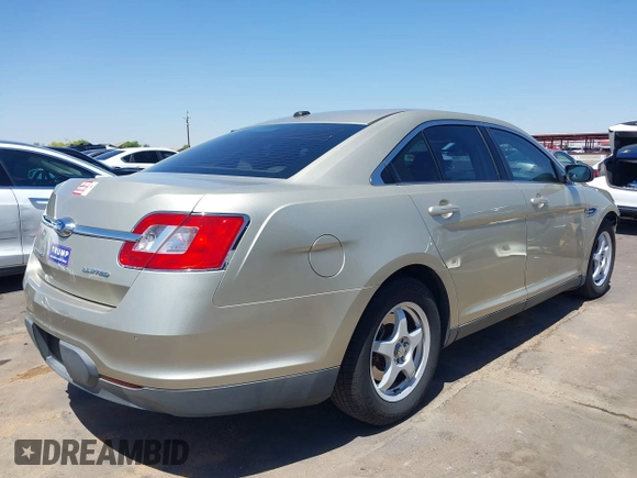 2010 Ford Taurus Limited with VIN 1FAHP2FW1AG140417, listed as a IAAI auction lot 42105832 with 118,403 mi miles. Bid and sale history available at carsss.com. Image 4.