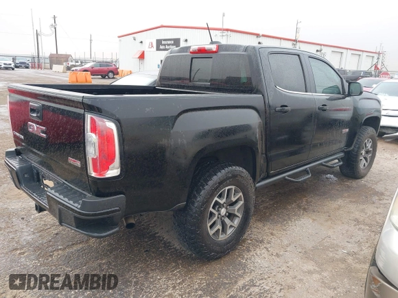 2015 GMC Canyon 4WD SLE with VIN 1GTG6BE39F1196261, listed as a IAAI auction lot 41703057 with 116,215 mi miles and . Bid and sale history available at carsss.com. Image 4.