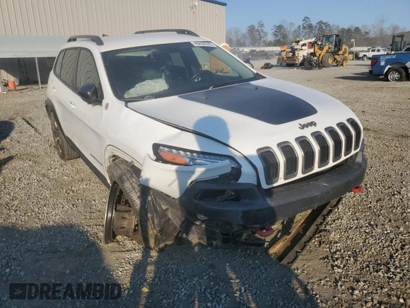 2015 Jeep Cherokee Trailhawk z VIN 1C4PJMBSXFW642149, wystawiony jako Copart lot #46656565 z przebiegiem 100 496 mil mil oraz Szkoda całkowita • Salvage title. Historia ofert i sprzedaży dostępna na DreamBid. Obrazek 4.