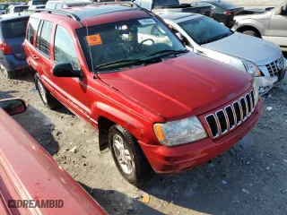 2003 Jeep Grand Cherokee Limited with VIN 1J8GW58N33C568751, listed as a Copart auction lot 71453464 with 277,216 mi miles and Salvage Title. Bid and sale history available at carsss.com. Image 4.