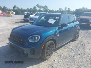2022 MINI Countryman Cooper S with VIN WMZ53BR02N3N36112, listed as a IAAI auction lot 42561840 with 60,479 mi miles and . Bid and sale history available at DreamBid. Image 2.