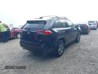 2022 Toyota RAV4 XLE with VIN 2T3P1RFV5NW259010, listed as a IAAI auction lot 42707037 with 60,955 mi miles and . Bid and sale history available at DreamBid. Image 4.