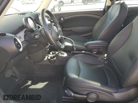 2012 MINI Hardtop with VIN WMWSU3C59CT542610, listed as a Copart auction lot 56720805 with 106,187 mi miles and Salvage Title. Bid and sale history available at DreamBid. Image 7.
