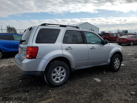 2009 Mazda Tribute Touring with VIN 4F2CZ02709KM07640, listed as a Copart auction lot 83662644 with NaN miles and Salvage Title. Bid and sale history available at carsss.com. Image 3.