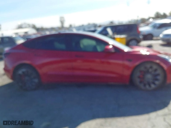 2021 Tesla Model 3 Performance with VIN 5YJ3E1EC7MF997237, listed as a IAAI auction lot 41387544 with 64,450 mi miles. Bid and sale history available at carsss.com. Image 13.