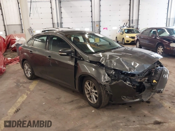 2015 Ford Focus SE with VIN 1FADP3F2XFL201554, listed as a IAAI auction lot 41817418 with 101,938 mi miles. Bid and sale history available at carsss.com. Image 1.