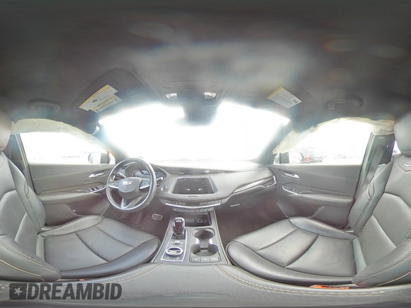2023 Cadillac XT4 AWD Sport z VIN 1GYFZFR45PF128521, wystawiony jako Copart lot #53185325 z przebiegiem 17 657 mil mil oraz Szkoda całkowita • Salvage title. Historia ofert i sprzedaży dostępna na DreamBid. Obrazek 14.