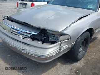 1995 Ford Crown Victoria с VIN 2FALP73W5SX140346, выставлен на аукционе IAAI как лот 41974429 с пробегом 166 540 миль миль и . История ставок и продаж доступна на DreamBid. Изображение 6.