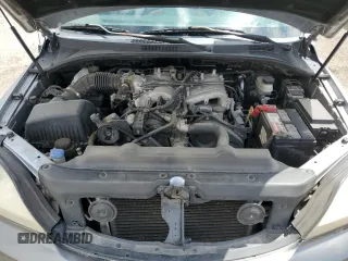 2006 Kia Sorento LX z VIN KNDJD733265572903, wystawiony jako Copart lot #56123945 z przebiegiem 185 664 mil mil oraz Szkoda całkowita • Salvage title. Historia ofert i sprzedaży dostępna na DreamBid. Obrazek 12.
