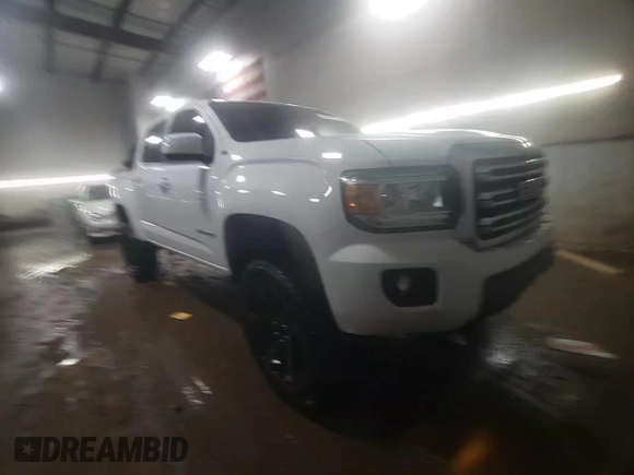 2015 GMC Canyon 4WD SLE with VIN 1GTG6BE36F1187064, listed as a Copart auction lot 46594735 with 109,987 mi miles and Salvage Title. Bid and sale history available at carsss.com. Image 13.
