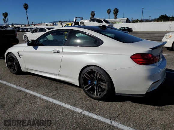 2015 BMW M4 with VIN WBS3R9C55FK330561, listed as a Copart auction lot 40490133 with 65,127 mi miles. Bid and sale history available at carsss.com. Image 2.