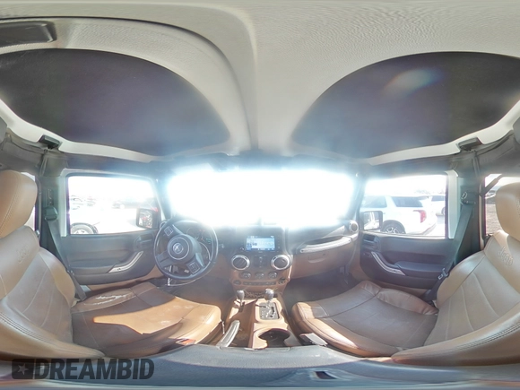 2012 Jeep Wrangler Unlimited Sahara z VIN 1C4HJWEG4CL159731, wystawiony jako Copart lot #59968695 z przebiegiem 111 918 mil mil oraz Szkoda całkowita • Salvage title. Historia ofert i sprzedaży dostępna na DreamBid. Obrazek 14.