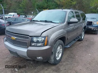 2013 Chevrolet Suburban LT with VIN 1GNSKJE70DR119447, listed as a IAAI auction lot 42169717 with 112,089 mi miles and . Bid and sale history available at DreamBid. Image 2.