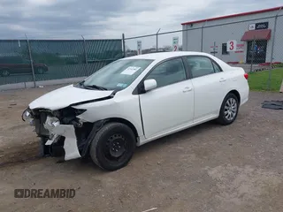 2013 Toyota Corolla L with VIN 2T1BU4EE7DC046672, listed as a IAAI auction lot 42142984 with 144,762 mi miles. Bid and sale history available at carsss.com. Image 2.