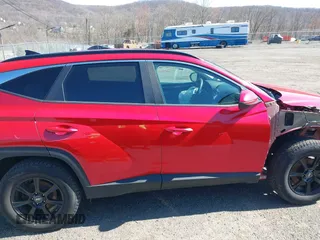 2022 Hyundai Tucson SEL z VIN 5NMJBCAE6NH157310, wystawiony jako IAAI lot #41938479 z przebiegiem 48 929 mil mil oraz . Historia ofert i sprzedaży dostępna na DreamBid. Obrazek 13.