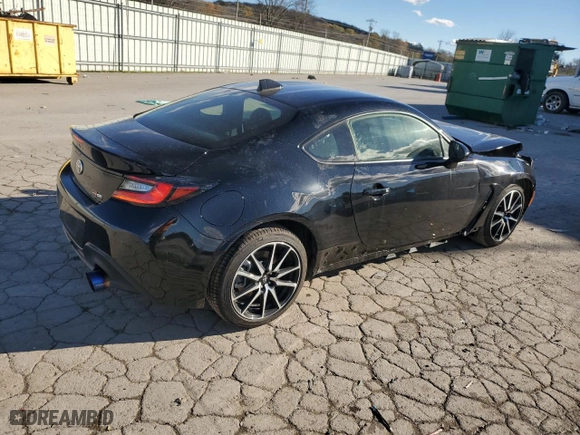 2023 Toyota GR86 with VIN JF1ZNBB12P9763031, listed as a Copart auction lot 81593314 with 7,411 mi miles and Salvage Title. Bid and sale history available at carsss.com. Image 3.
