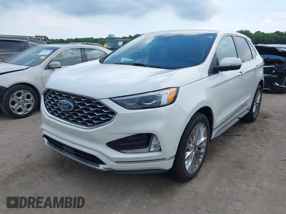 2021 Ford Edge Titanium with VIN 2FMPK4K96MBA18546, listed as a IAAI auction lot 42584326 with 65,214 mi miles and . Bid and sale history available at DreamBid. Image 18.