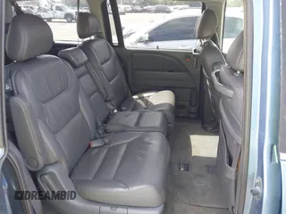 2006 Honda Odyssey EX-L z VIN 5FNRL38706B075356, wystawiony jako IAAI lot #42021960 z przebiegiem 120 455 mil mil oraz . Historia ofert i sprzedaży dostępna na DreamBid. Obrazek 8.