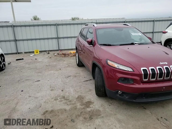 2015 Jeep Cherokee Latitude with VIN 1C4PJLCB3FW712356, listed as a Copart auction lot 51616355 with 153,972 mi miles and Salvage Title. Bid and sale history available at DreamBid. Image 11.