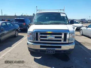 2014 Ford Econoline Passenger XL with VIN 1FBNE3BL7EDA37146, listed as a IAAI auction lot 41871526 with 139,387 mi miles. Bid and sale history available at carsss.com. Image 13.
