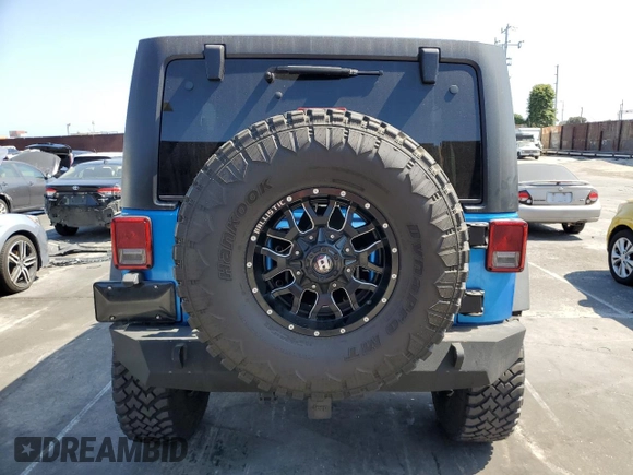 2015 Jeep Wrangler Unlimited Rubicon с VIN 1C4BJWFG9FL591529, выставлен на аукционе Copart как лот 58721265 с пробегом 110 373 миль миль и Чистый • Clean title. История ставок и продаж доступна на DreamBid. Изображение 6.
