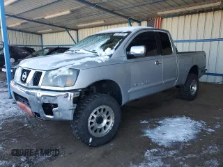 2005 Nissan Titan SE with VIN 1N6AA06B05N561722, listed as a Copart auction lot 41987285 with 203,558 mi miles and Salvage title. Bid and sale history available at DreamBid. Image 1.