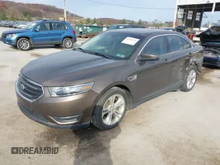 2015 Ford Taurus SEL with VIN 1FAHP2H87FG199865, listed as a IAAI auction lot 40760225 with 77,782 mi miles. Bid and sale history available at carsss.com. Image 17.