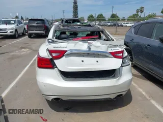 2016 Nissan Maxima SV z VIN 1N4AA6AP2GC437206, wystawiony jako IAAI lot #42082780 z przebiegiem Nie podano mil oraz . Historia ofert i sprzedaży dostępna na DreamBid. Obrazek 17.