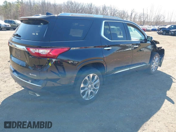 2018 Chevrolet Traverse Premier with VIN 1GNEVJKW8JJ159561, listed as a IAAI auction lot 41774914 with 132,598 mi miles and . Bid and sale history available at DreamBid. Image 4.