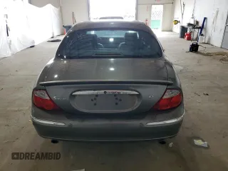 2003 Jaguar S-Type z VIN SAJEA01U93HM88490, wystawiony jako Copart lot #55721795 z przebiegiem 192 773 mil mil oraz Tytuł czysty. Historia ofert i sprzedaży dostępna na DreamBid. Obrazek 6.