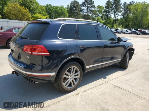 2015 Volkswagen Touareg Lux z VIN WVGEP9BP2FD006802, wystawiony jako Copart lot #52291965 z przebiegiem 122 787 mil mil oraz Szkoda całkowita • Salvage title. Historia ofert i sprzedaży dostępna na DreamBid. Obrazek 3.