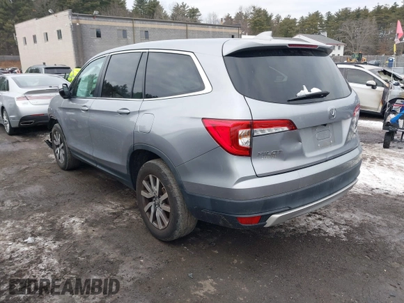 2021 Honda Pilot EX-L with VIN 5FNYF6H57MB010259, listed as a IAAI auction lot 41307012 with 57,849 mi miles. Bid and sale history available at carsss.com. Image 3.