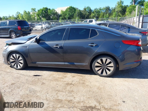 2011 Kia Optima SX z VIN KNAGR4A60B5126988, wystawiony jako IAAI lot #42313244 z przebiegiem 152 661 mil mil oraz . Historia ofert i sprzedaży dostępna na DreamBid. Obrazek 14.