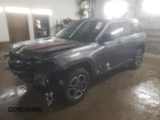 2022 Jeep Grand Cherokee Trailhawk with VIN 1C4RJHCG8N8572275, listed as a Copart auction lot 85665194 with 15,692 mi miles and Salvage title. Bid and sale history available at DreamBid. Image 1.