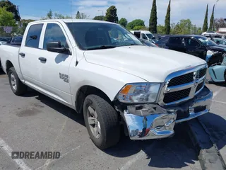 2022 Ram 1500 SLT z VIN 1C6RR6LG0NS185906, wystawiony jako IAAI lot #42012123 z przebiegiem 63 944 mil mil oraz . Historia ofert i sprzedaży dostępna na DreamBid. Obrazek 1.