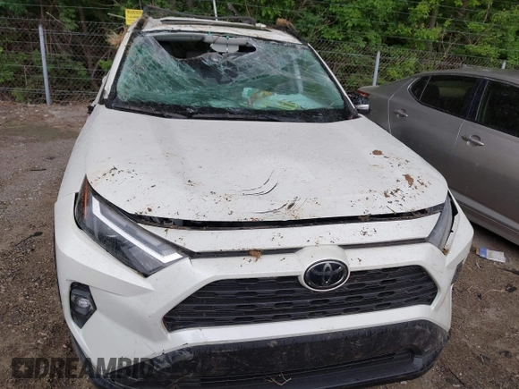 2022 Toyota RAV4 XLE Premium z VIN 2T3A1RFV1NW312419, wystawiony jako IAAI lot #42361686 z przebiegiem 14 291 mil mil oraz . Historia ofert i sprzedaży dostępna na DreamBid. Obrazek 17.