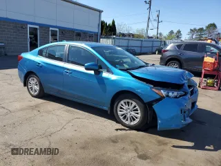2018 Subaru Impreza Premium with VIN 4S3GKAD63J3605854, listed as a Copart auction lot 54986795 with 59,119 mi miles and Salvage title. Bid and sale history available at DreamBid. Image 4.