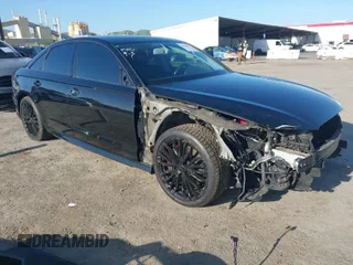 2016 Audi A6 3.0T Premium Plus with VIN WAUFGAFC2GN001285, listed as a IAAI auction lot 41938989 with 119,687 mi miles. Bid and sale history available at carsss.com. Image 1.