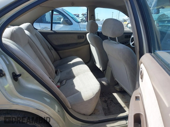 1999 Nissan Altima XE with VIN 1N4DL01D6XC179556, listed as a IAAI auction lot 41783234 with 129,064 mi miles. Bid and sale history available at carsss.com. Image 8.