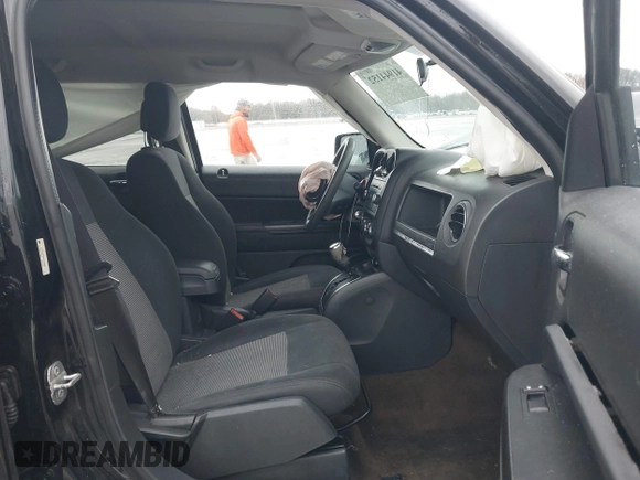 2014 Jeep Patriot Sport with VIN 1C4NJRBBXED879285, listed as a IAAI auction lot 41944152 with 103,676 mi miles. Bid and sale history available at carsss.com. Image 5.