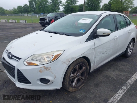 2013 Ford Focus SE with VIN 1FADP3F29DL306051, listed as a IAAI auction lot 42457611 with 86,817 mi miles and . Bid and sale history available at DreamBid. Image 2.