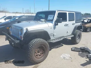 2012 Jeep Wrangler Unlimited Sport with VIN 1C4BJWDG8CL270788, listed as a IAAI auction lot 41758929 with 138,935 mi miles. Bid and sale history available at carsss.com. Image 17.