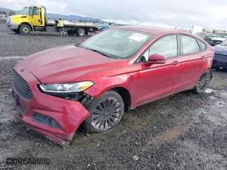 2016 Ford Fusion Energi SE Luxury with VIN 3FA6P0PU5GR229496, listed as a IAAI auction lot 41228921 with 86,393 mi miles. Bid and sale history available at carsss.com. Image 2.