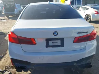 2018 BMW 5 Series M550i xDrive with VIN WBAJB9C54JB050218, listed as a IAAI auction lot 41132695 with 69,659 mi miles. Bid and sale history available at carsss.com. Image 15.
