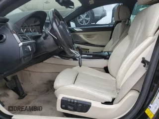 2014 BMW 6 Series 650i z VIN WBA6B2C5XED128959, wystawiony jako Copart lot #44201745 z przebiegiem 146 875 mil mil oraz Szkoda całkowita • Salvage title. Historia ofert i sprzedaży dostępna na DreamBid. Obrazek 7.