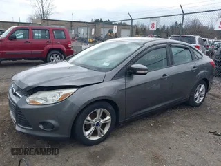 2014 Ford Focus SE with VIN 1FADP3F21EL193164, listed as a IAAI auction lot 41882924 with 122,469 mi miles. Bid and sale history available at carsss.com. Image 2.